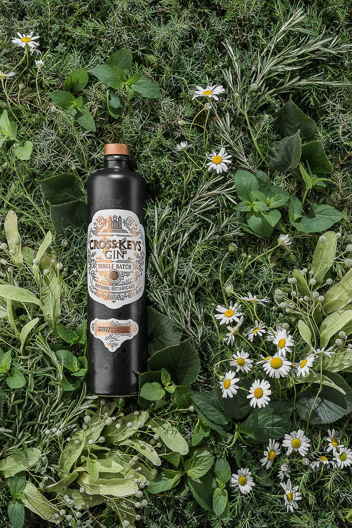 Dark Bottle, Yellow Flowers – Brand Photography Portfolio