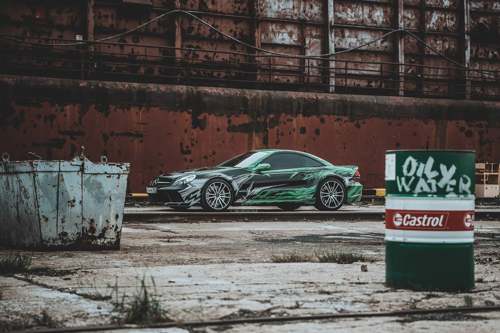 Black Car, Factory Background – Professional Vehicle Photography