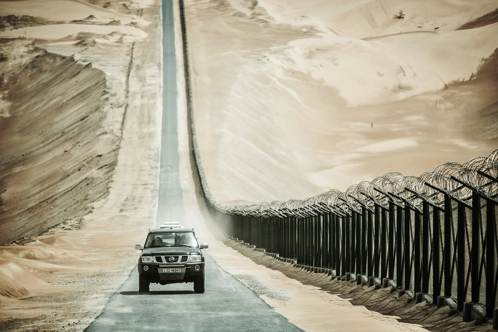 Black SUV Driving on a Road, Candid Moment – Professional Vehicle Photography