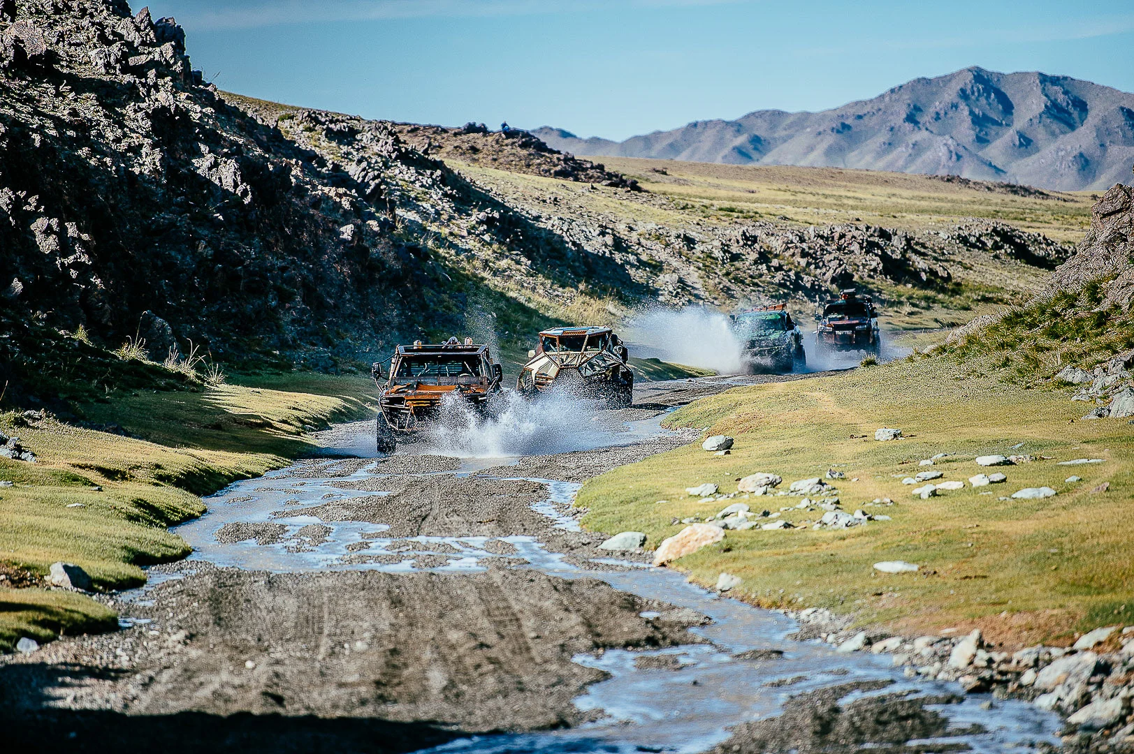 Black Car Driving on a Gravel Road – Automotive Photography Portfolio