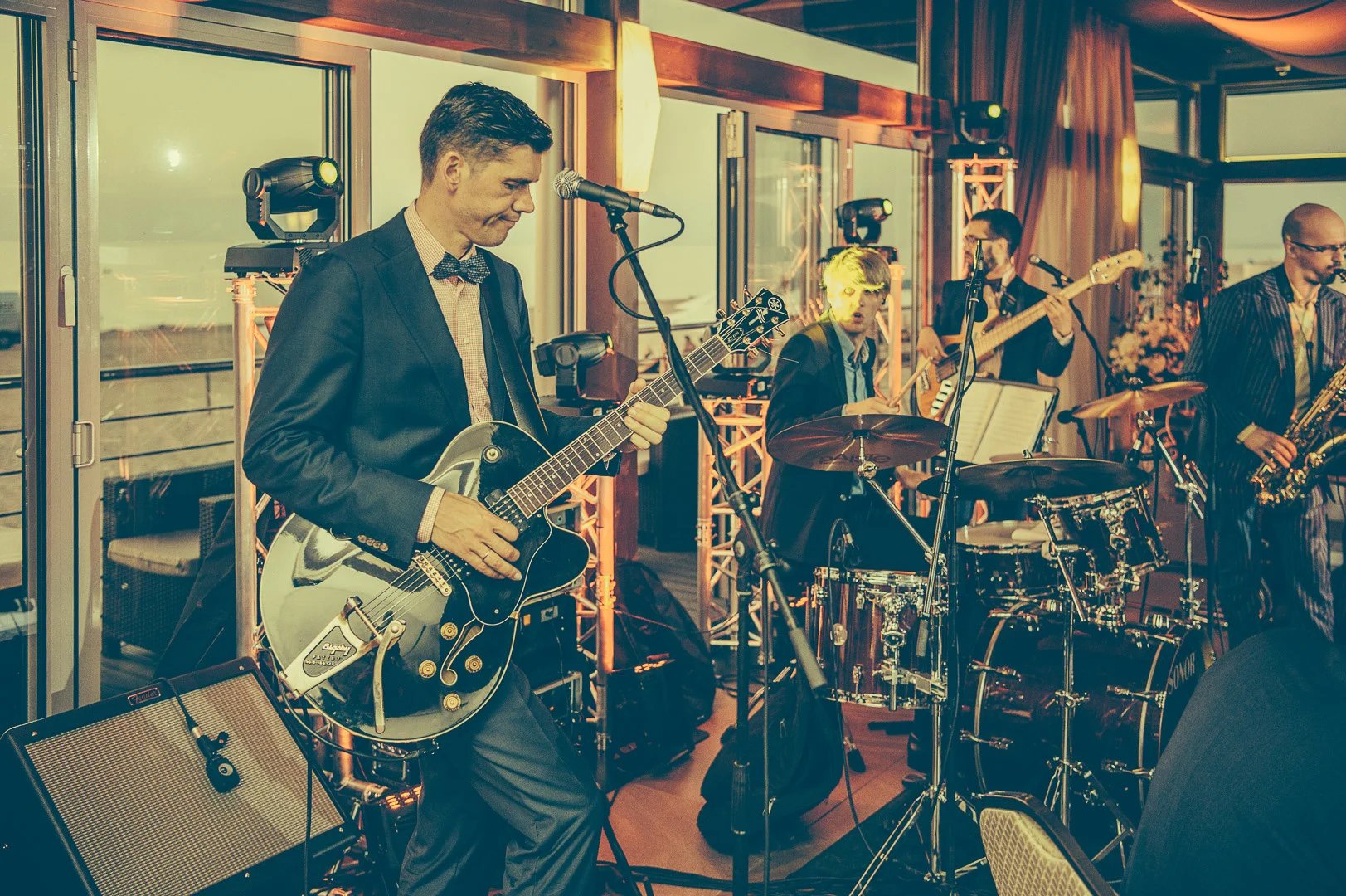 Event Photography, Man with Guitar – Conference Photography