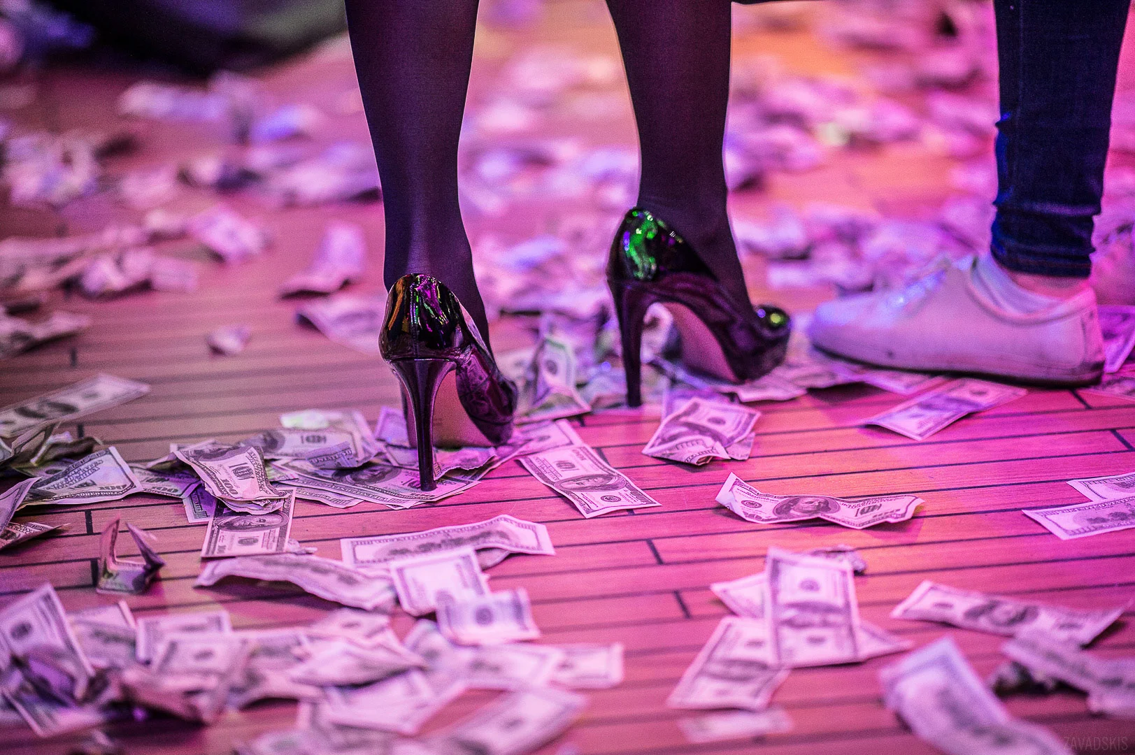 Woman in Gold Heels Standing on Carpet – Conference Photography