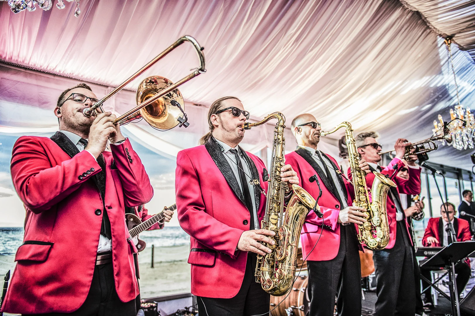 Saxophone Player Performing on Stage – Conference Photography