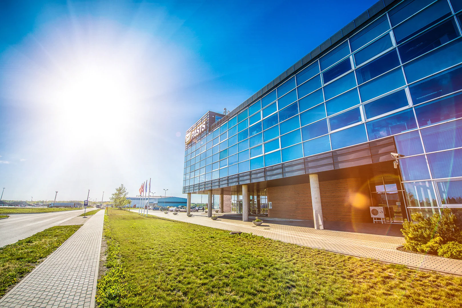 Modern Building with Tall Facade and Garden – Modern Architecture Photography