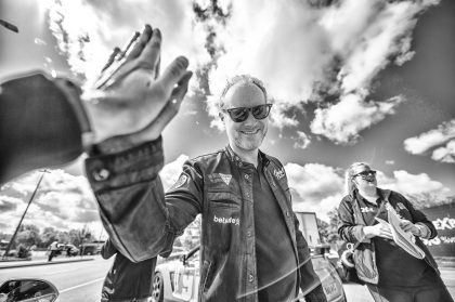 Man in Sunglasses Outdoors, Sunny Day Photograph – Conference Photography