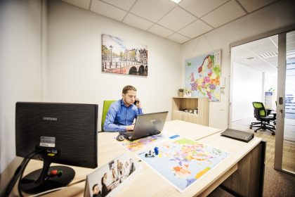 Man Working at Desk, Office – Industrial Photography Portfolio