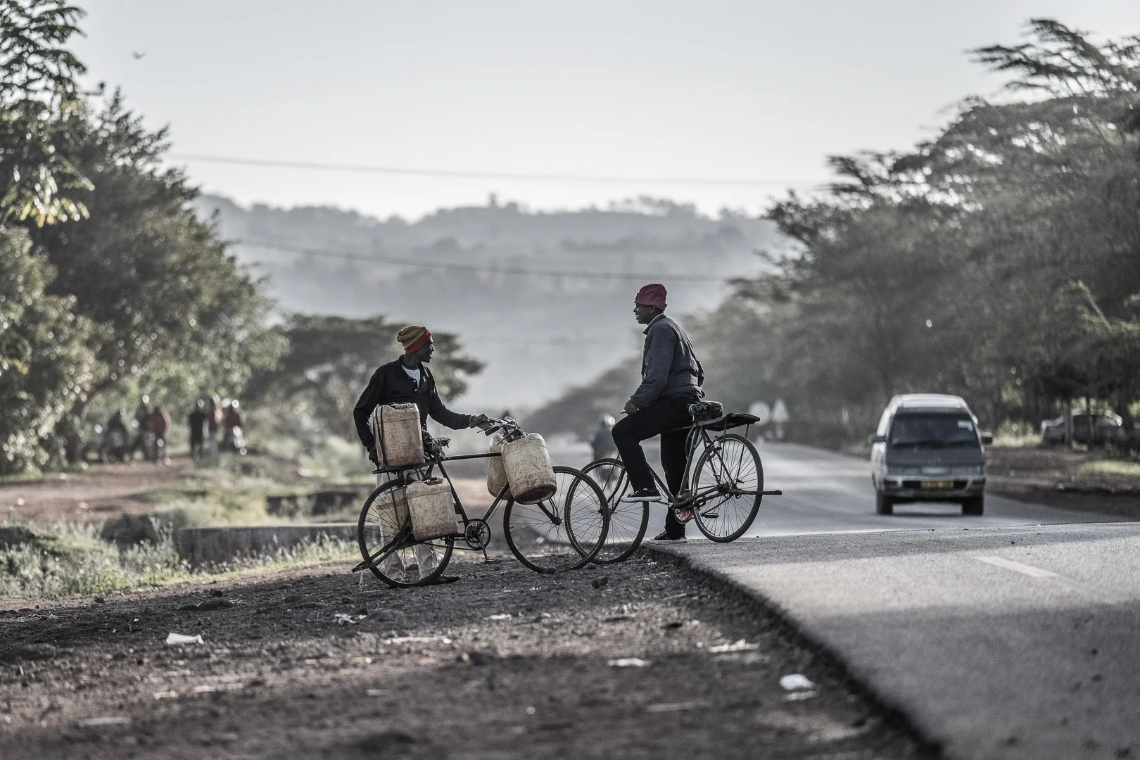 Man with Bicycle, Road – Editorial Travel Image